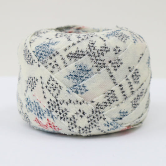 Black, blue, and red ikat pattern on white wool (Y02402011)