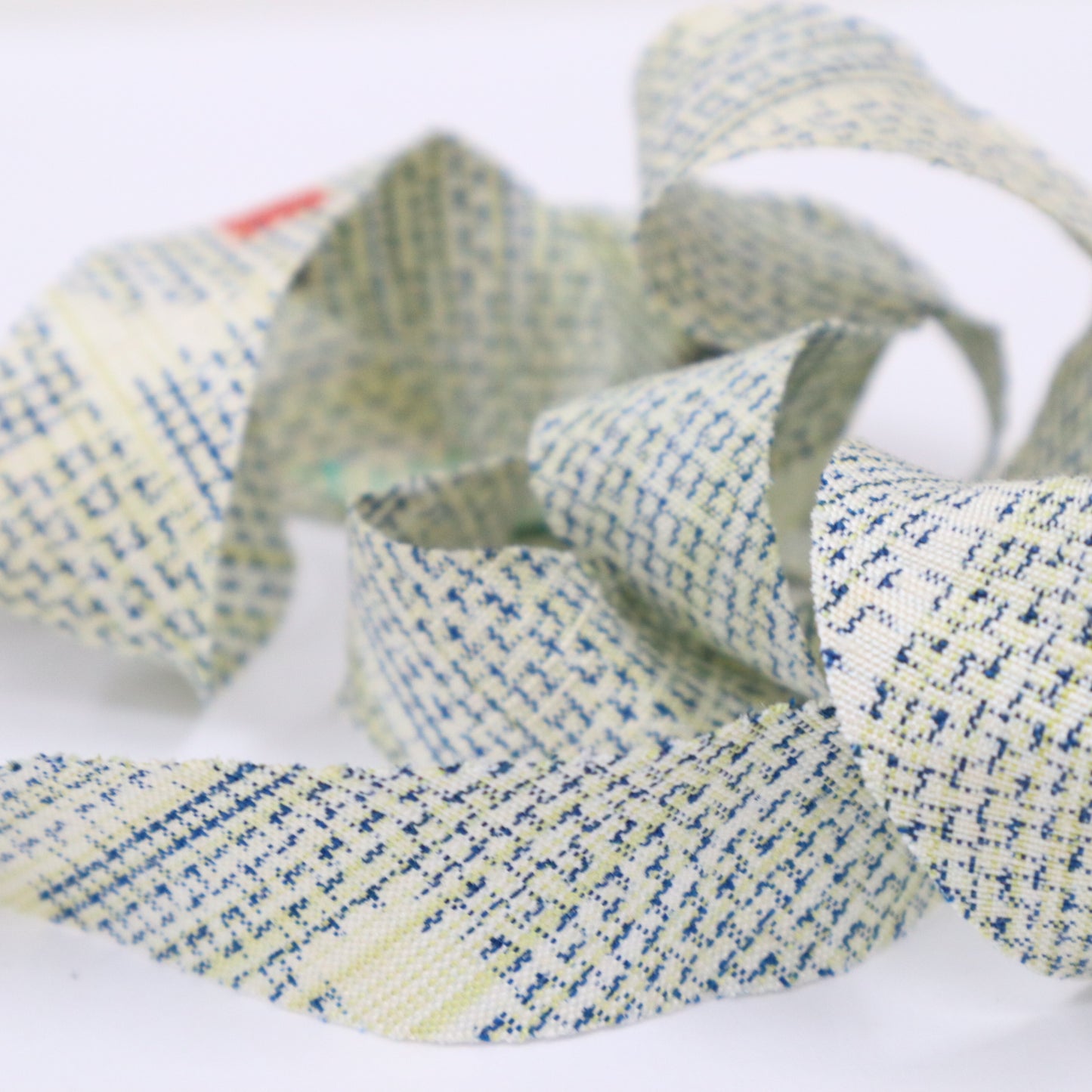 Navy blue and yellow mosquito kasuri pattern on a white background (Y02408010)