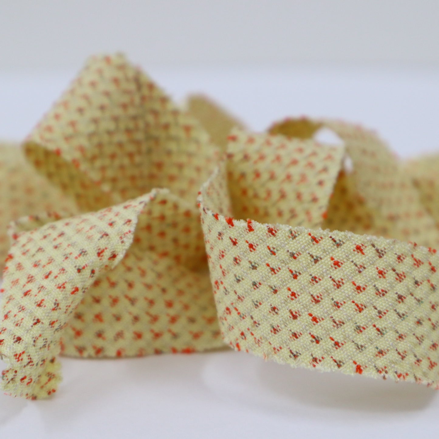 Egg-colored and orange mosquito-inspired tsumugi (Y02401021)