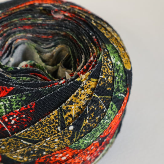 Muslin with red, yellow and green floral pattern on a black background (Y02507003)