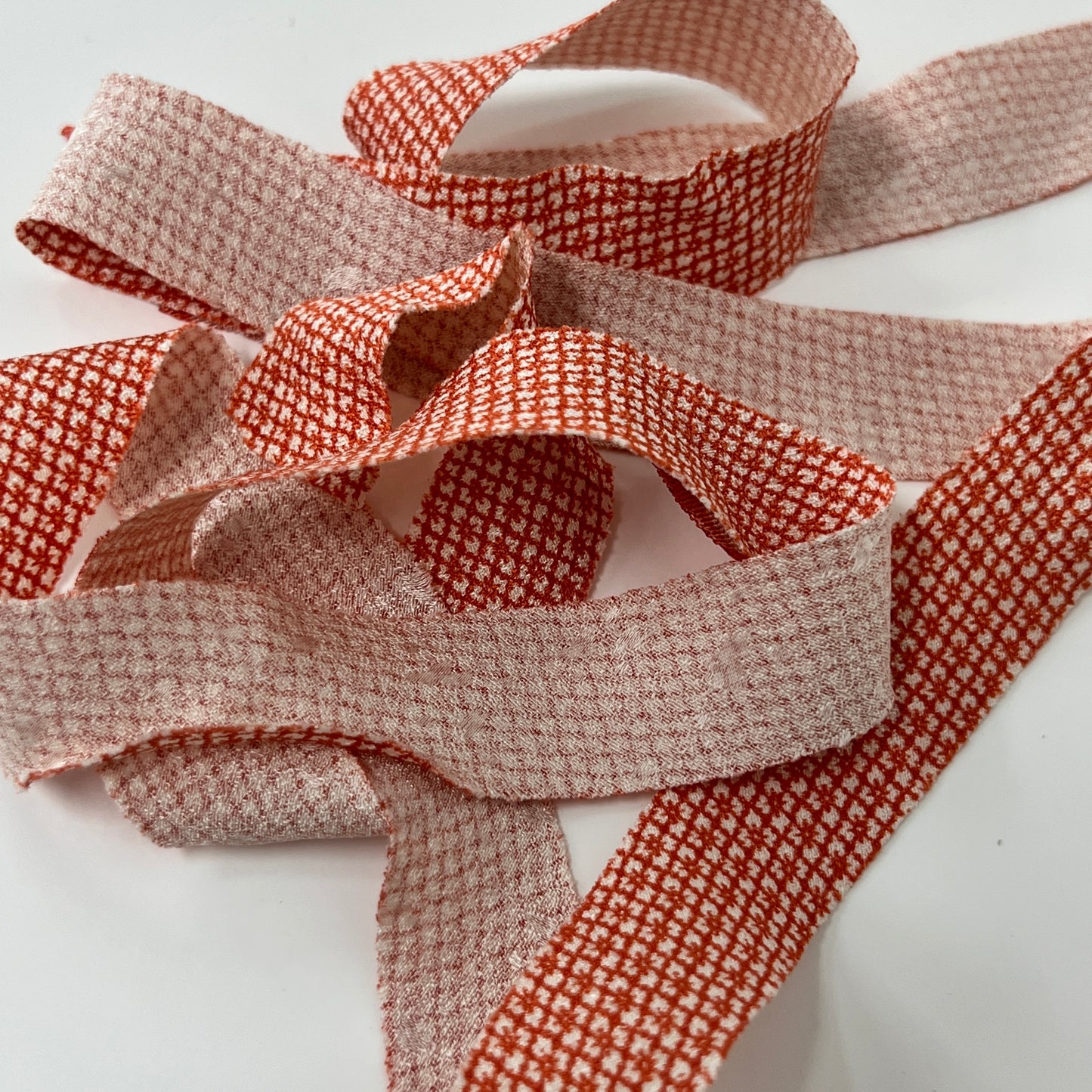 Orange and white Hanabishi Edo Komon crepe (Y02009004)