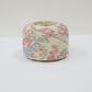White tsumugi with autumn leaf pattern in pink, light blue, and yellow-green (Y02305009)