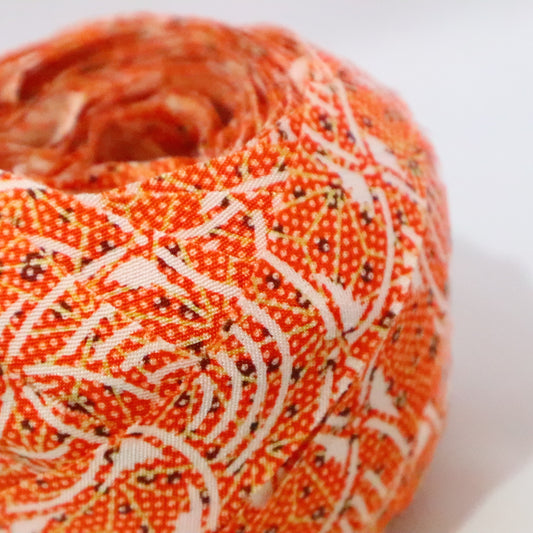 Geometric pattern/synthetic fiber in tangerine color (Y02309022)