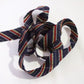 Navy blue with red and yellow striped pattern/mixed weave (Y02311035)