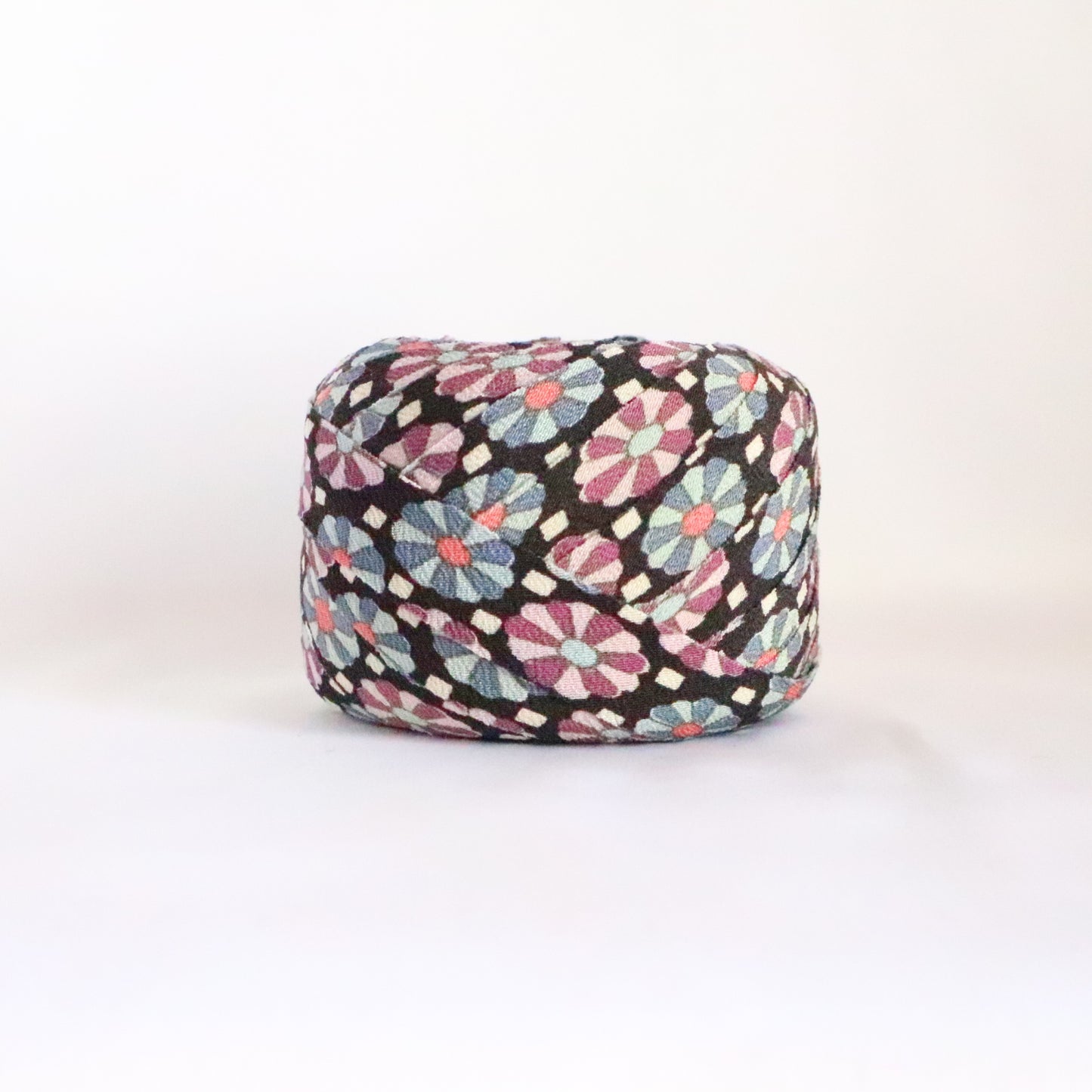 Black with light blue and purple floral pattern, crepe (Y02311025)