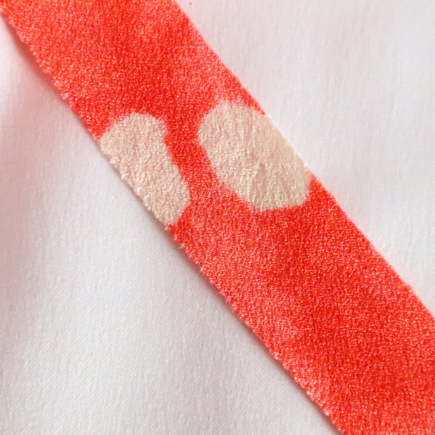 Coral bead color with white hail and abstract pattern, crepe (Y02312014)
