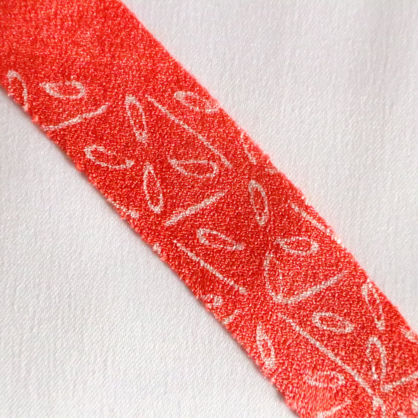 Coral bead color with white hail and abstract pattern, crepe (Y02312014)