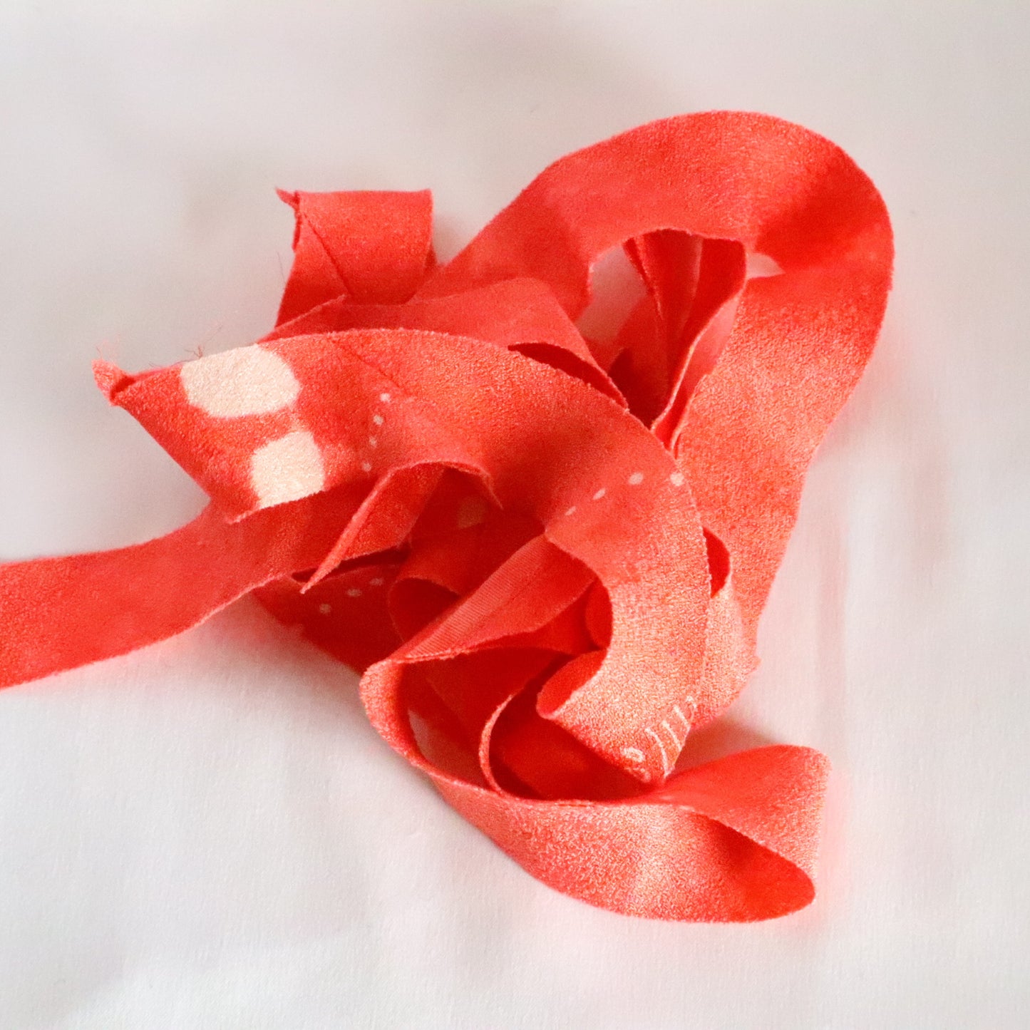 Coral bead color with white hail and abstract pattern, crepe (Y02312014)