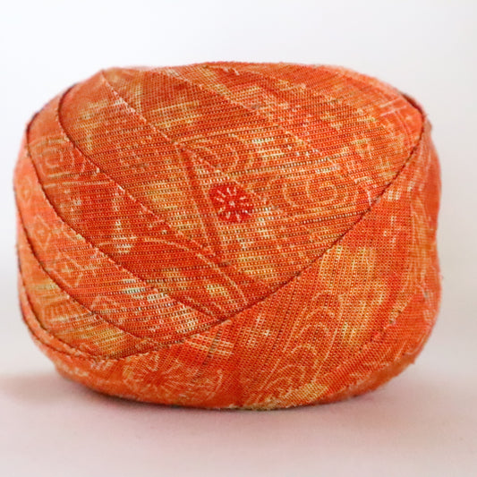 淡いオレンジ（紅樺色）の更紗柄・紬（Y02312015）