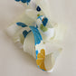 Light cream with red, green, blue, and yellow floral pattern, synthetic fiber (Y02601004)