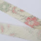 White tsumugi with autumn leaf pattern in pink, light blue, and yellow-green (Y02305009)