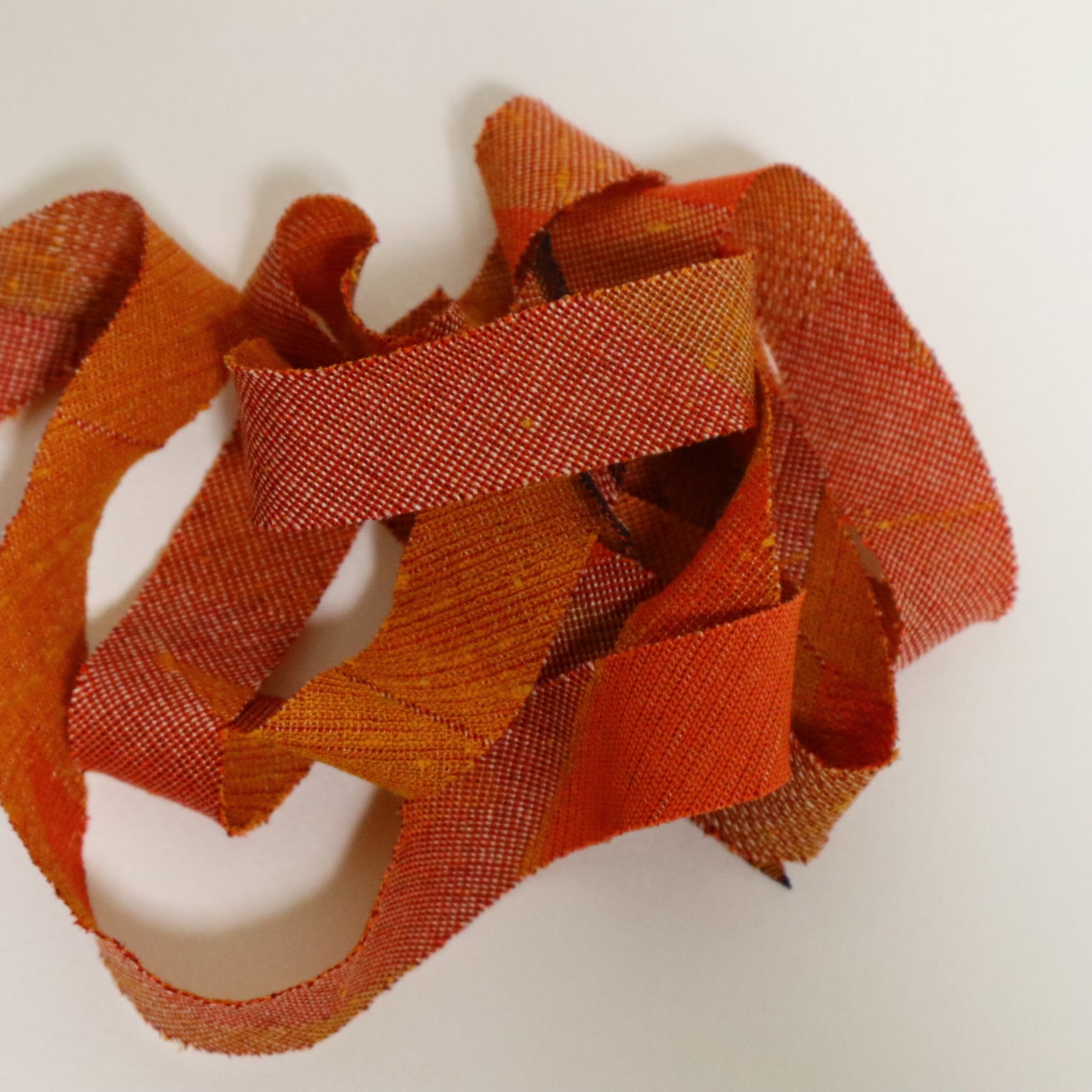 Orange, brick, and brown gradation with mixed weave (Y02601008)