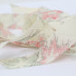 White tsumugi with autumn leaf pattern in pink, light blue, and yellow-green (Y02305009)
