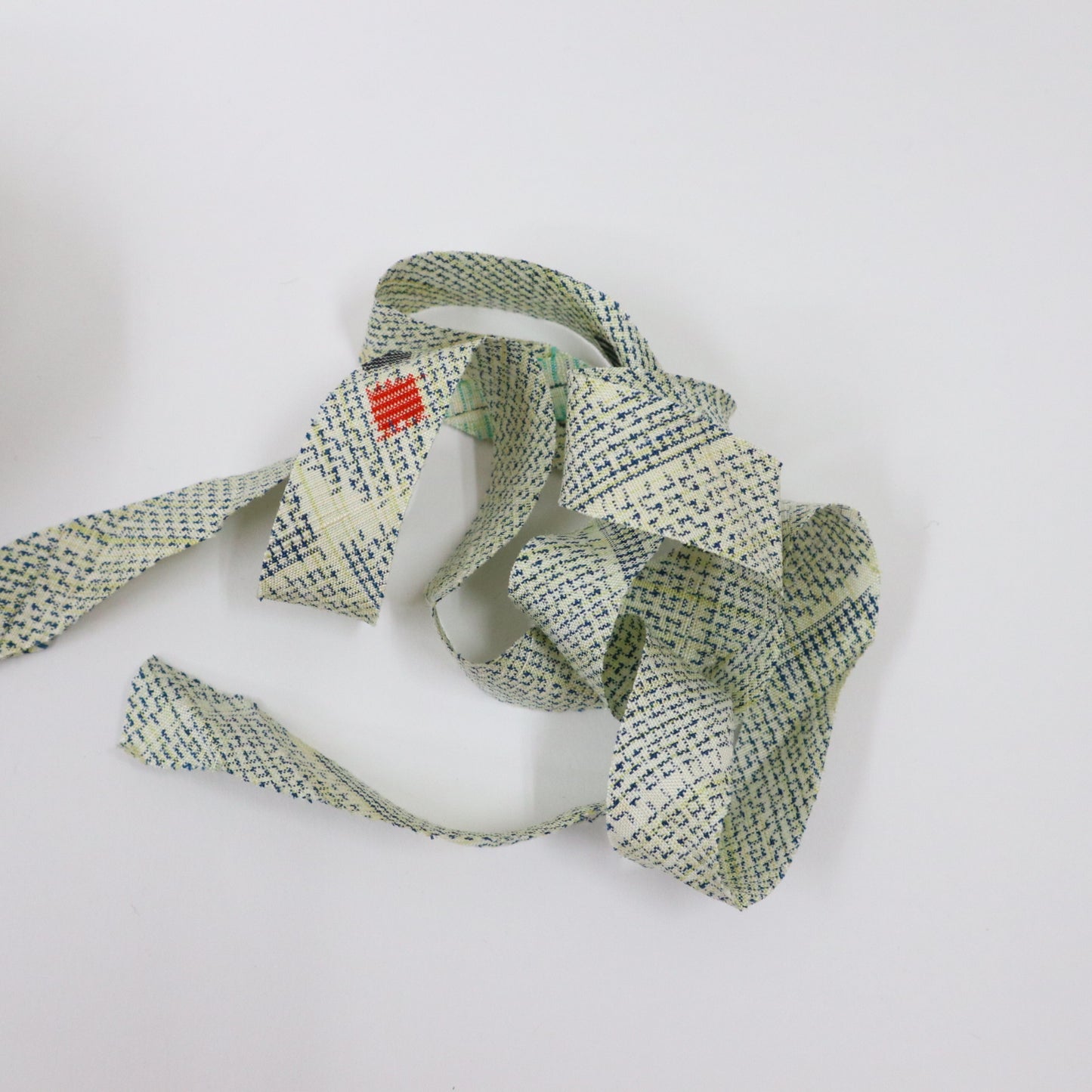 Navy blue and yellow mosquito kasuri pattern on a white background (Y02408010)