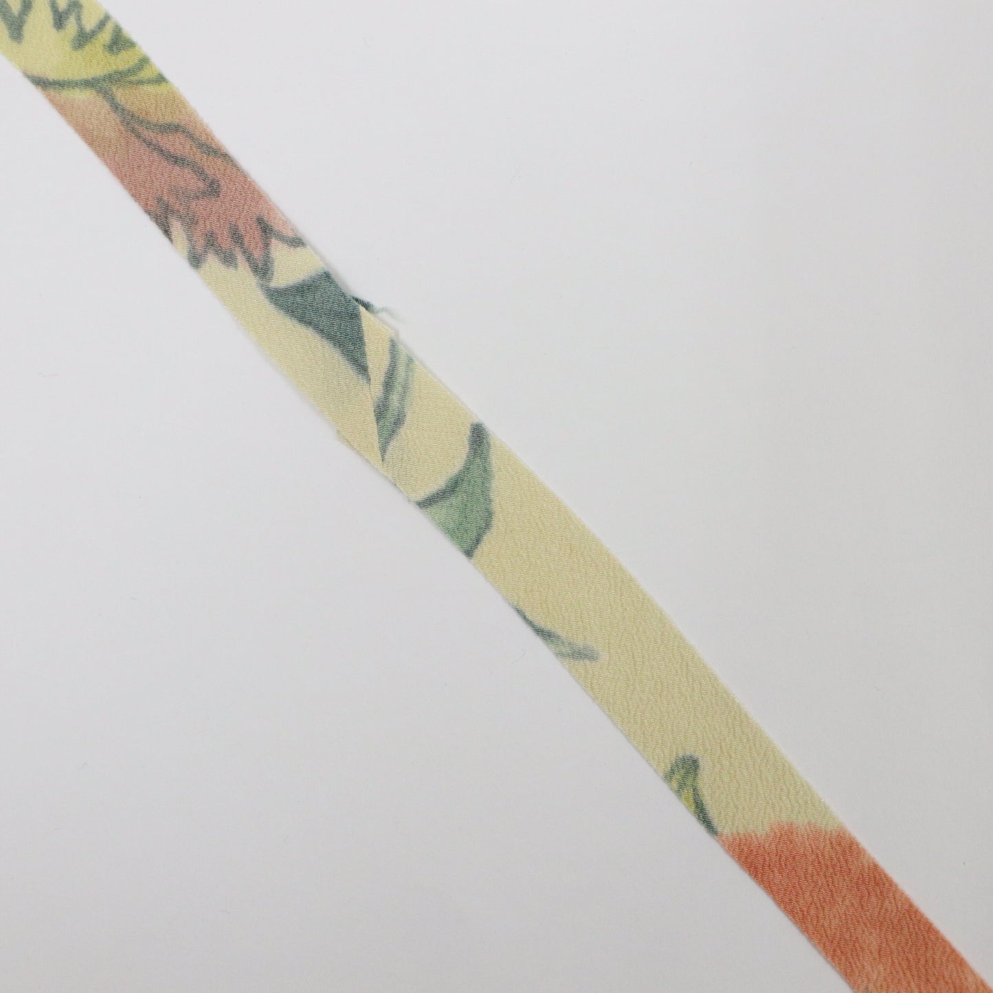 Natural light blue, pink, and yellow floral crepe (Y02003049)