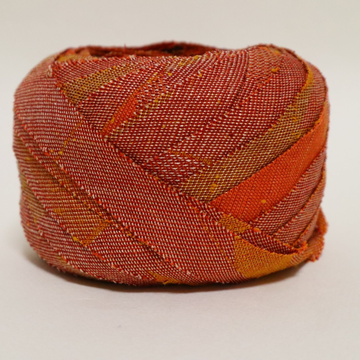 Orange, brick, and brown gradation with mixed weave (Y02601008)