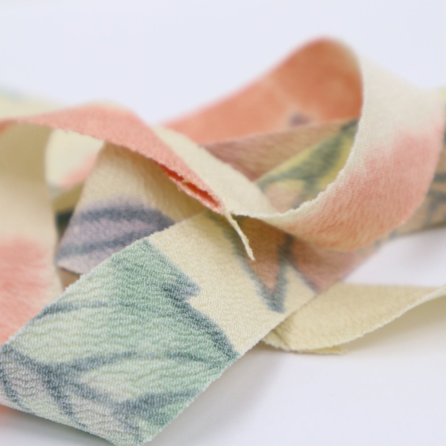 Natural light blue, pink, and yellow floral crepe (Y02003049)