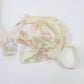 White tsumugi with autumn leaf pattern in pink, light blue, and yellow-green (Y02305009)