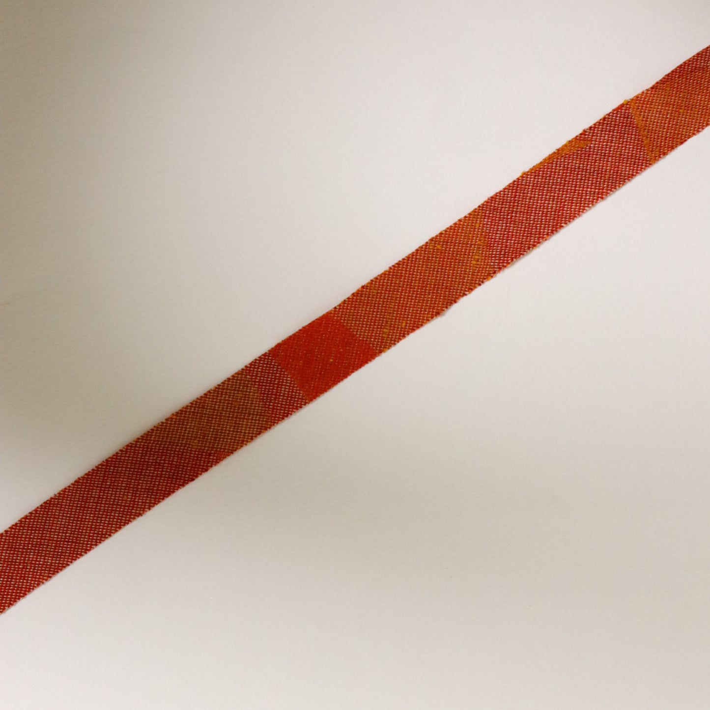 Orange, brick, and brown gradation with mixed weave (Y02601008)