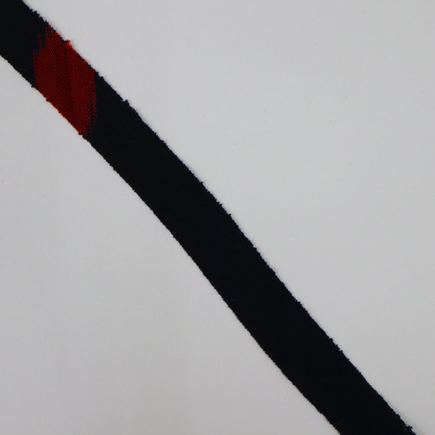 Dark blue wool with red and white ikat pattern (Y02403001)