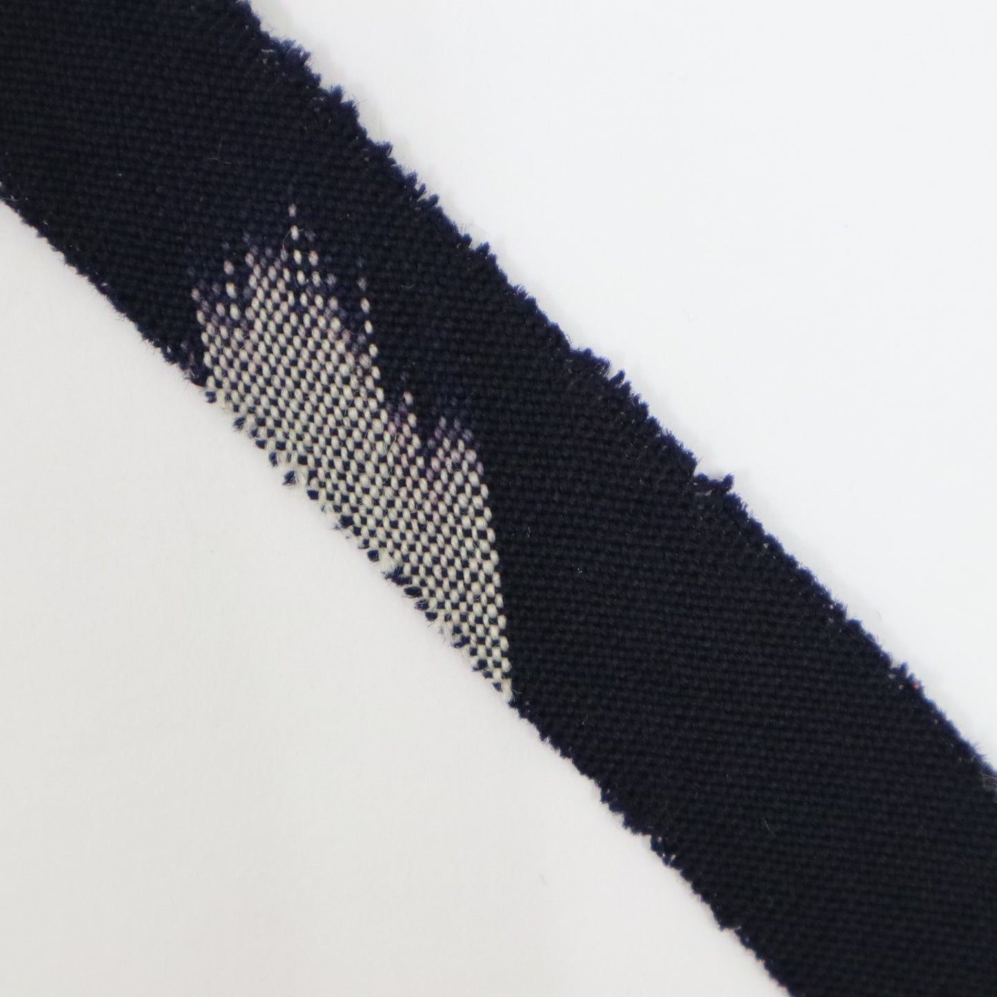 Dark blue wool with red and white ikat pattern (Y02403001)