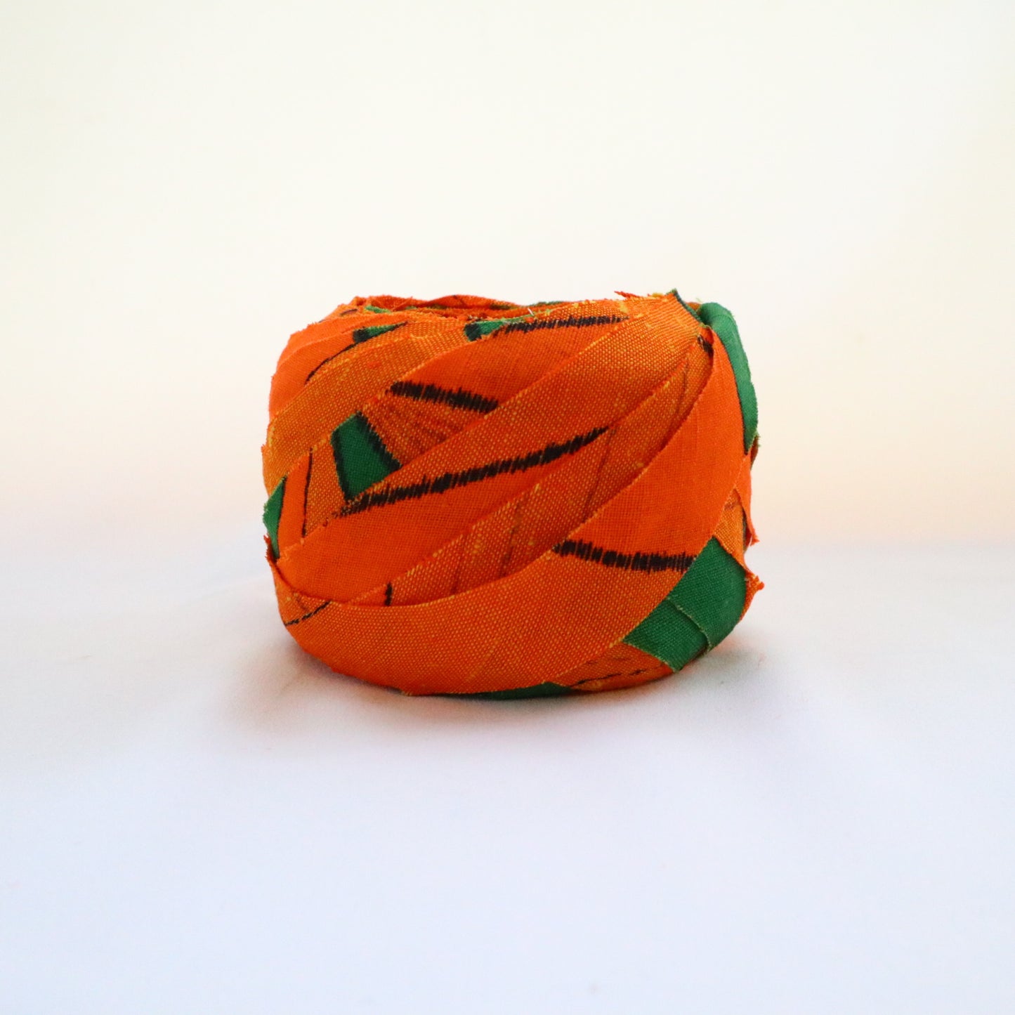 Orange with large green geometric pattern, wool (Y02105024)