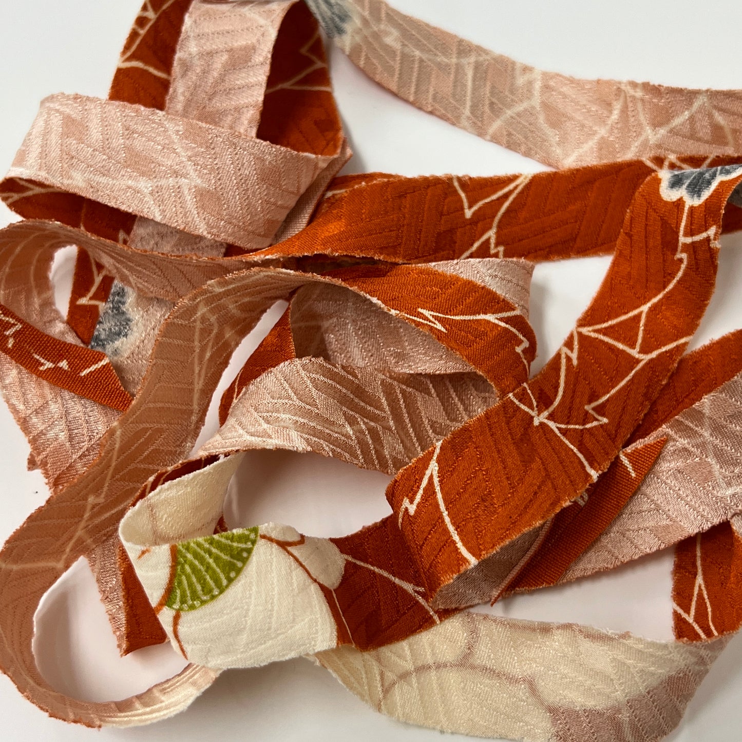 Orange with white peonies and leaves, gray floral pattern, crepe (Y02202025)