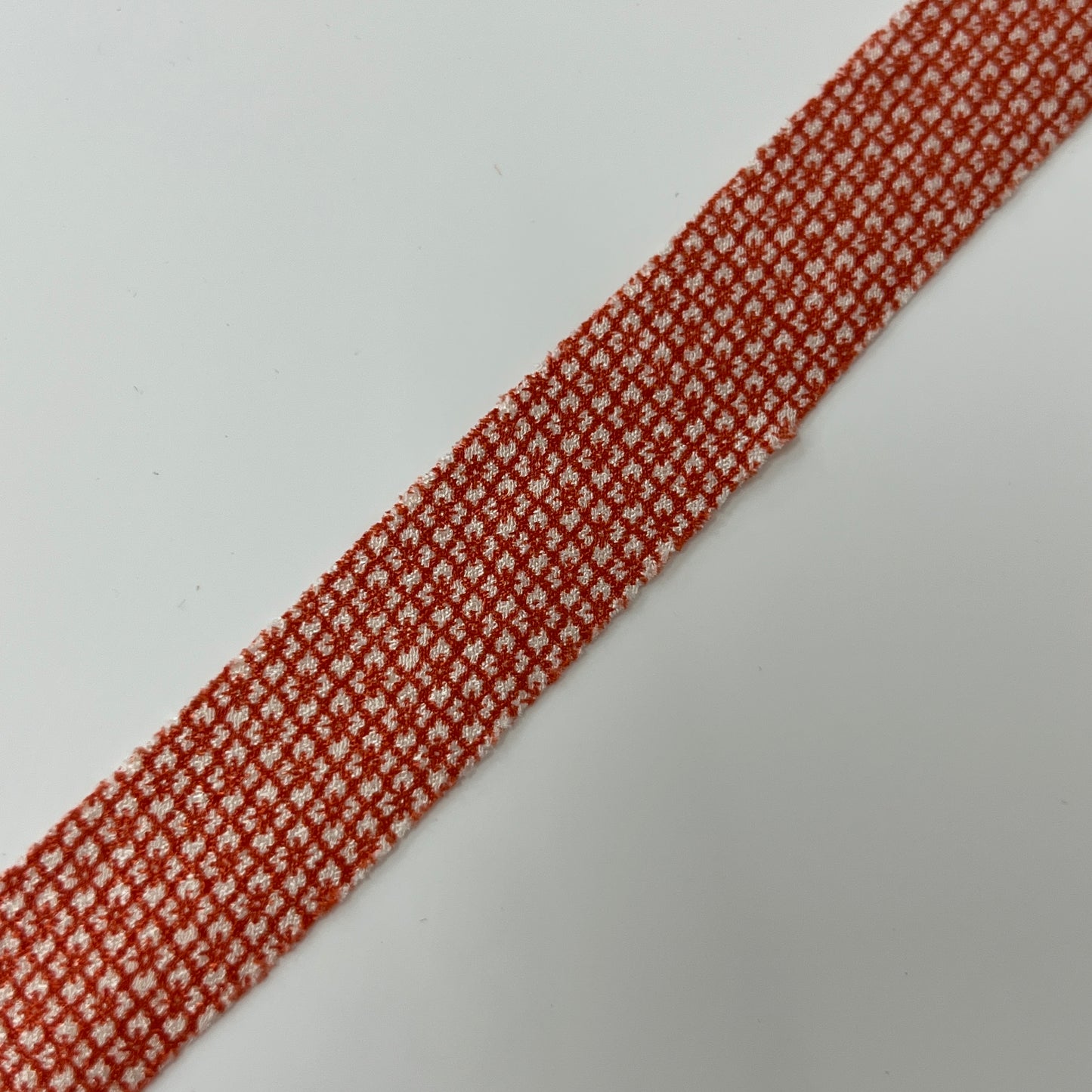 Orange and white Hanabishi Edo Komon crepe (Y02009004)