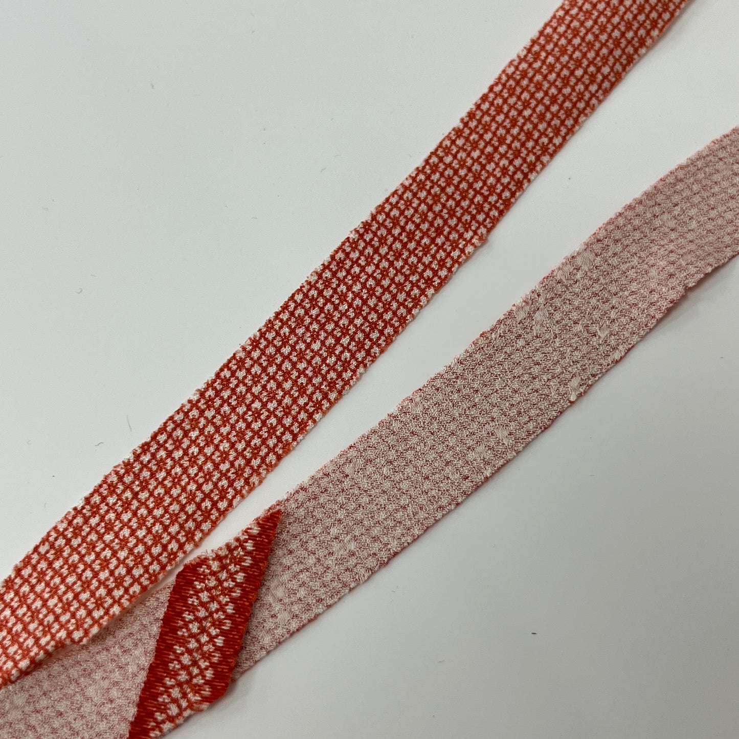 Orange and white Hanabishi Edo Komon crepe (Y02009004)