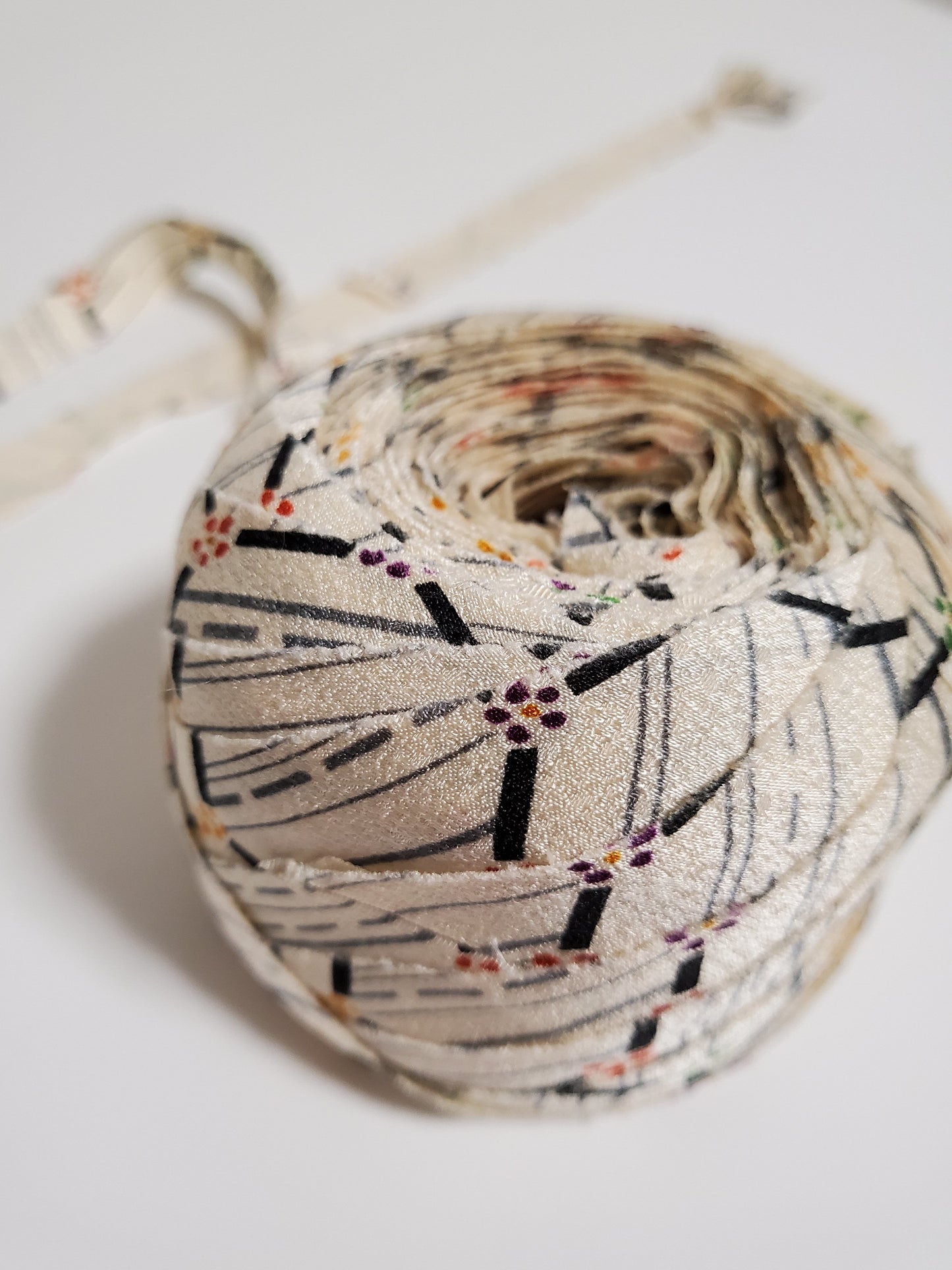 Gray abstract pattern on a white background, yellow, red, purple and green florets (Y00010182)