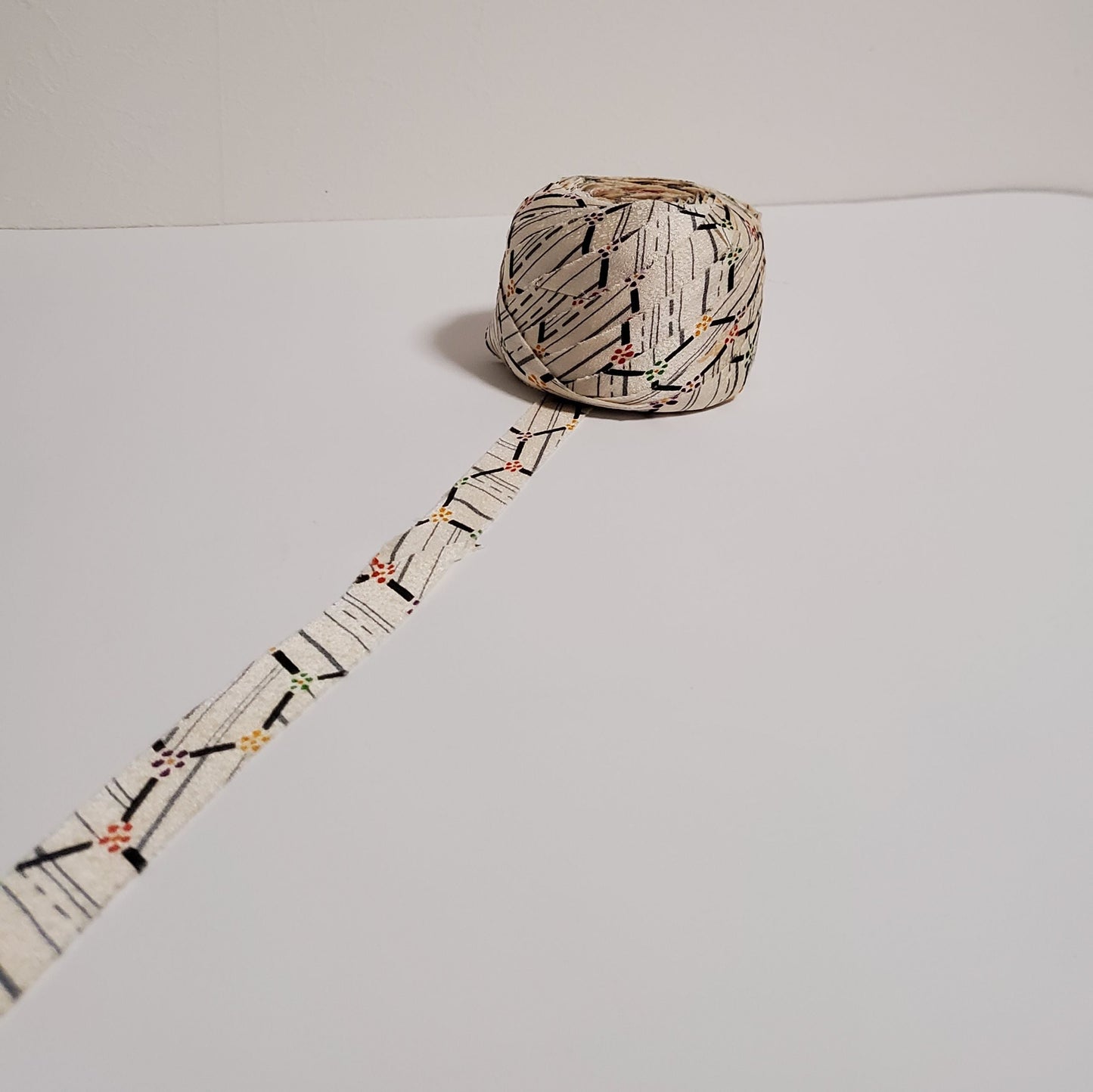 Gray abstract pattern on a white background, yellow, red, purple and green florets (Y00010182)