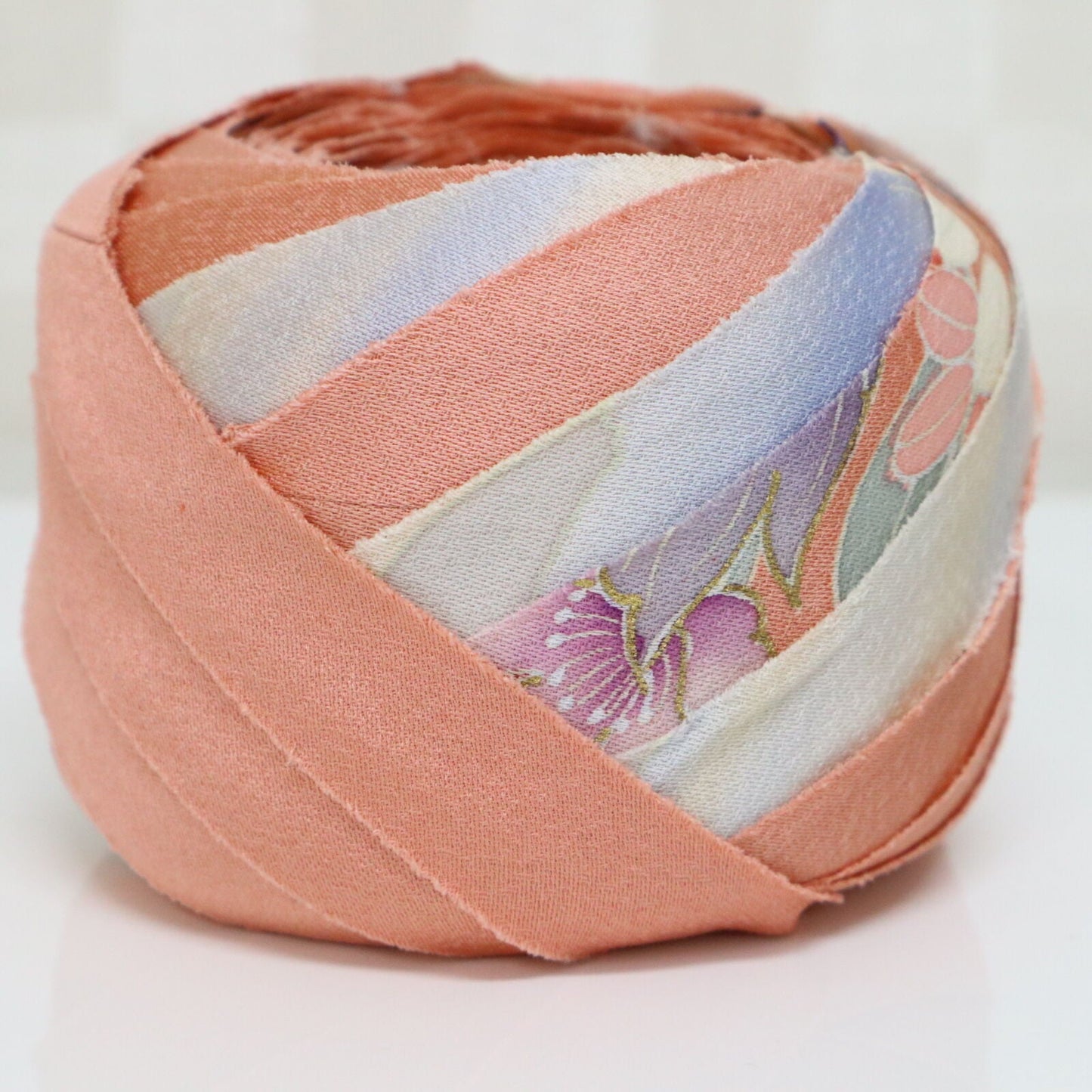 Pale pink tsukesage with chrysanthemums, peonies, and other flowers and a drum design, pure silk (Y02008072)