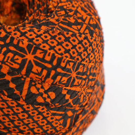 Orange pique and rhombus pattern on black, crepe (Y02009109)