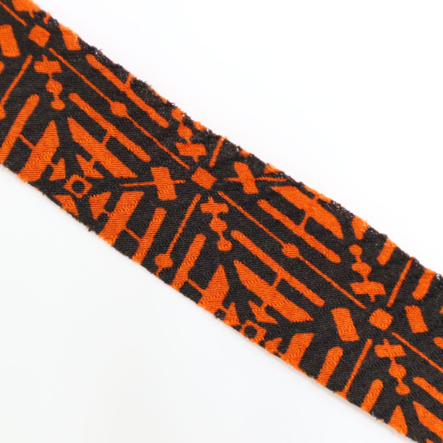 Orange pique and rhombus pattern on black, crepe (Y02009109)